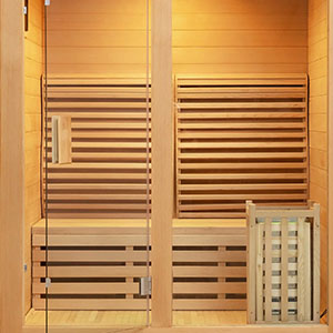 Comparing Traditional and Infrared Saunas Family Image